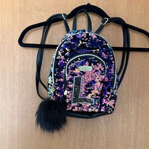 Justice Multicolor Sequin Backpack with Black Pom Pom